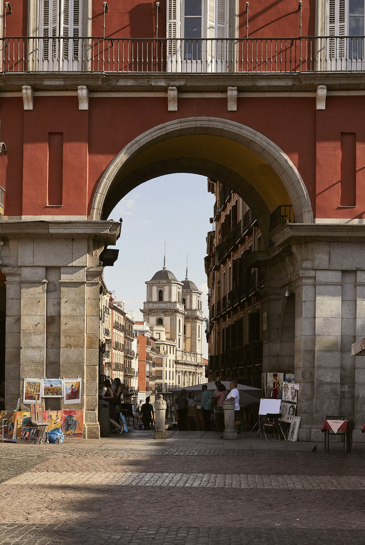 Visitors crossing Plaza Mayor in Madrid