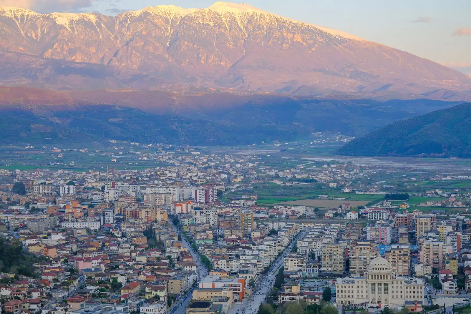Shkodër's buildings with mountains in the distance
