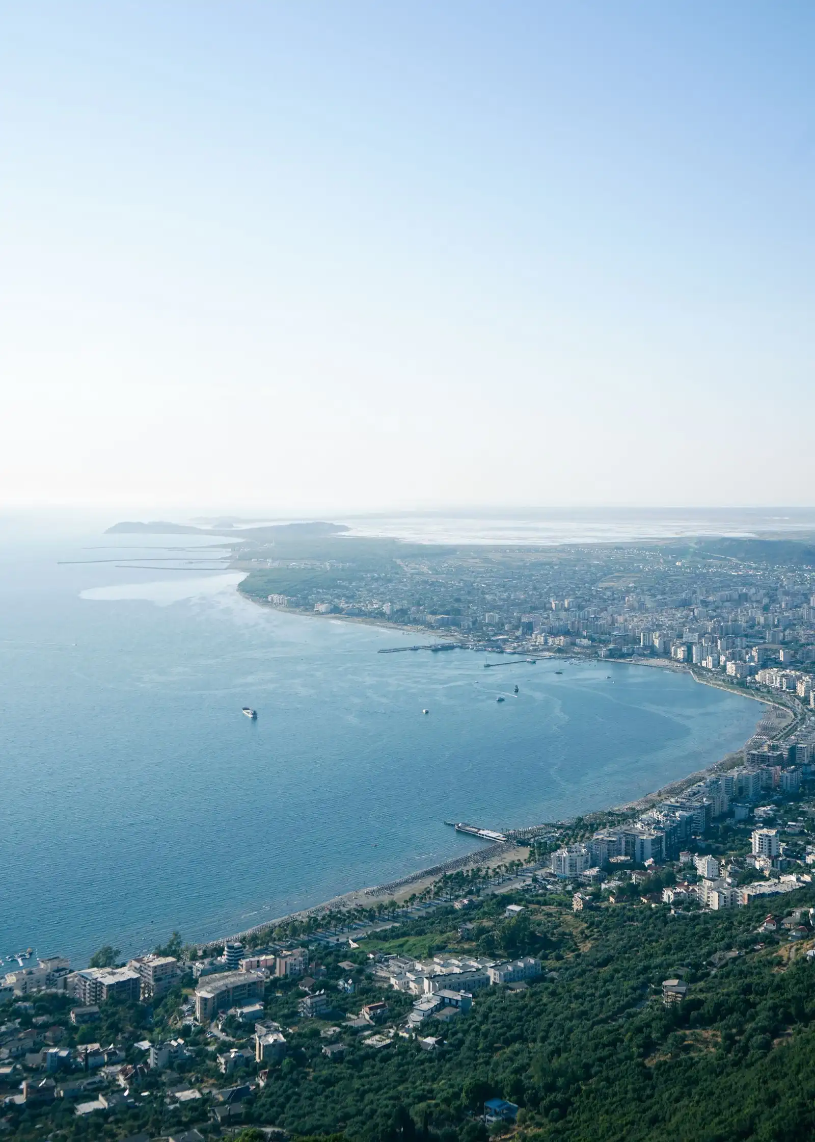 Vlorë's buildings and beaches along the bay