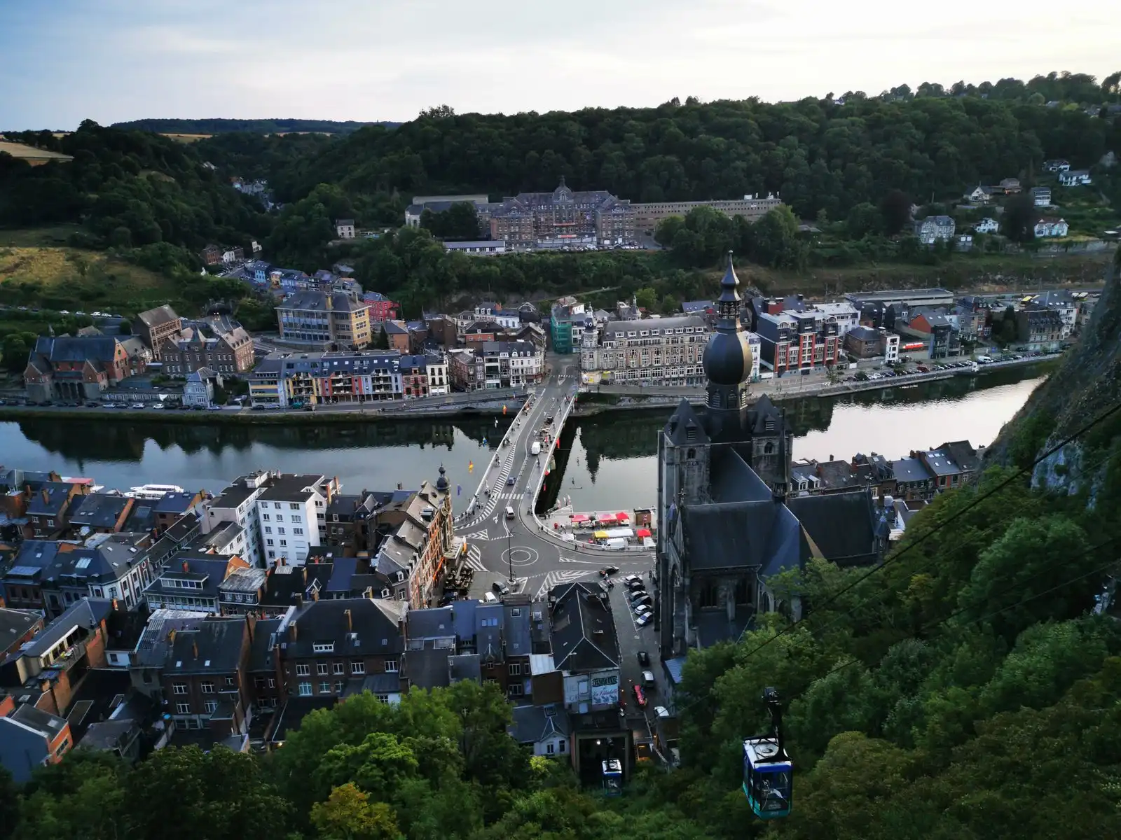 Dinant's church and buildings beside the Meuse River