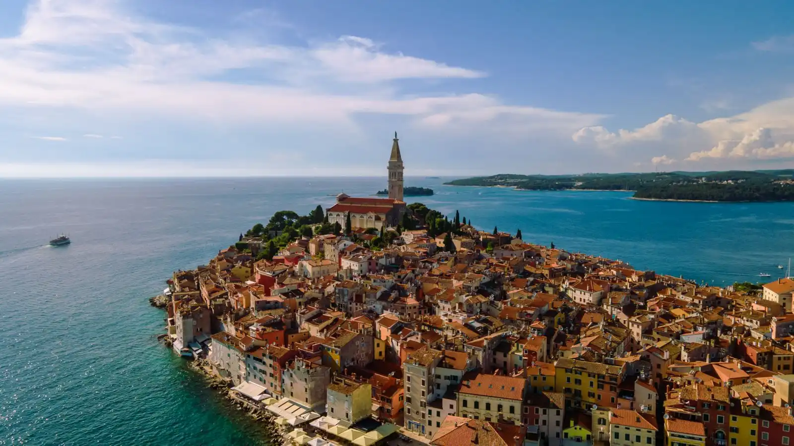 Rovinj's old town and church tower beside the Adriatic Sea