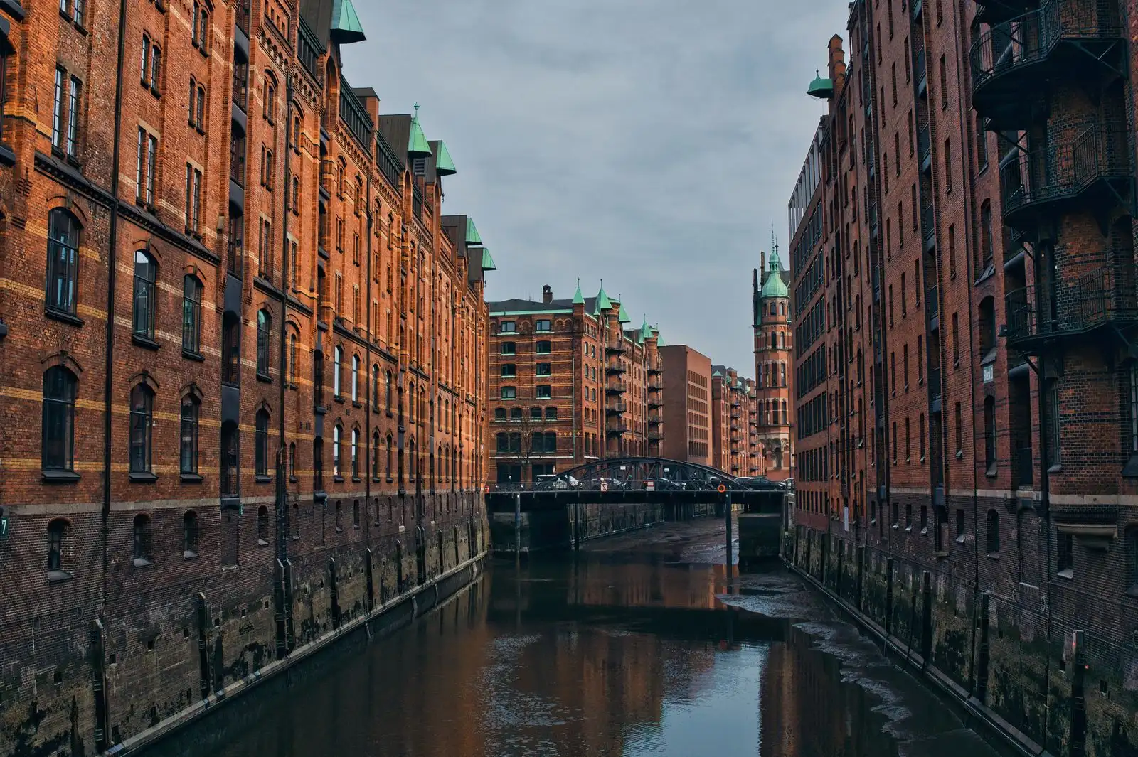 Brick warehouses beside a canal in Hamburg's Speicherstadt