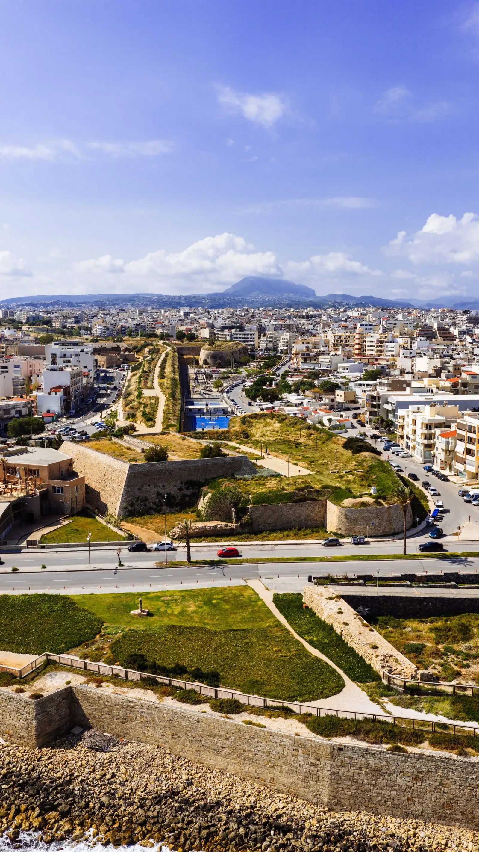 Heraklion's Venetian walls surrounded by city buildings in Crete