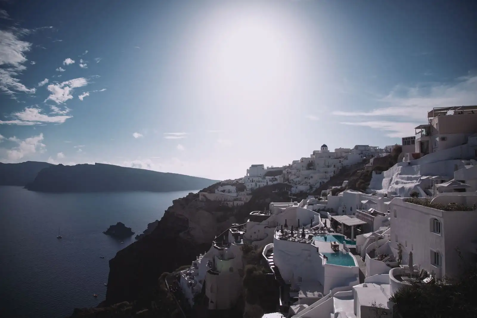 Santorini's white buildings above the sea and caldera