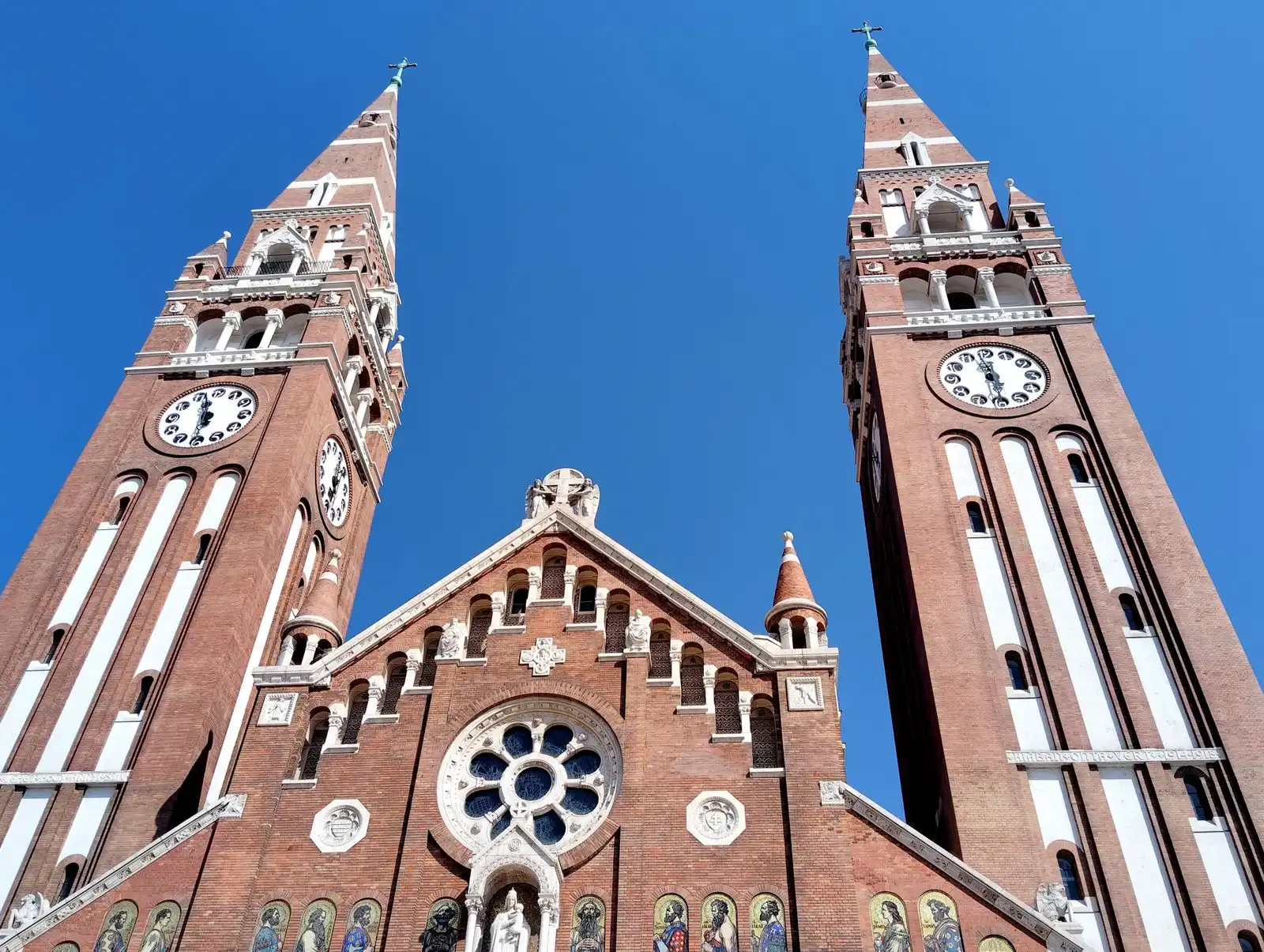 The twin towers and facade of Szeged's Votive Church