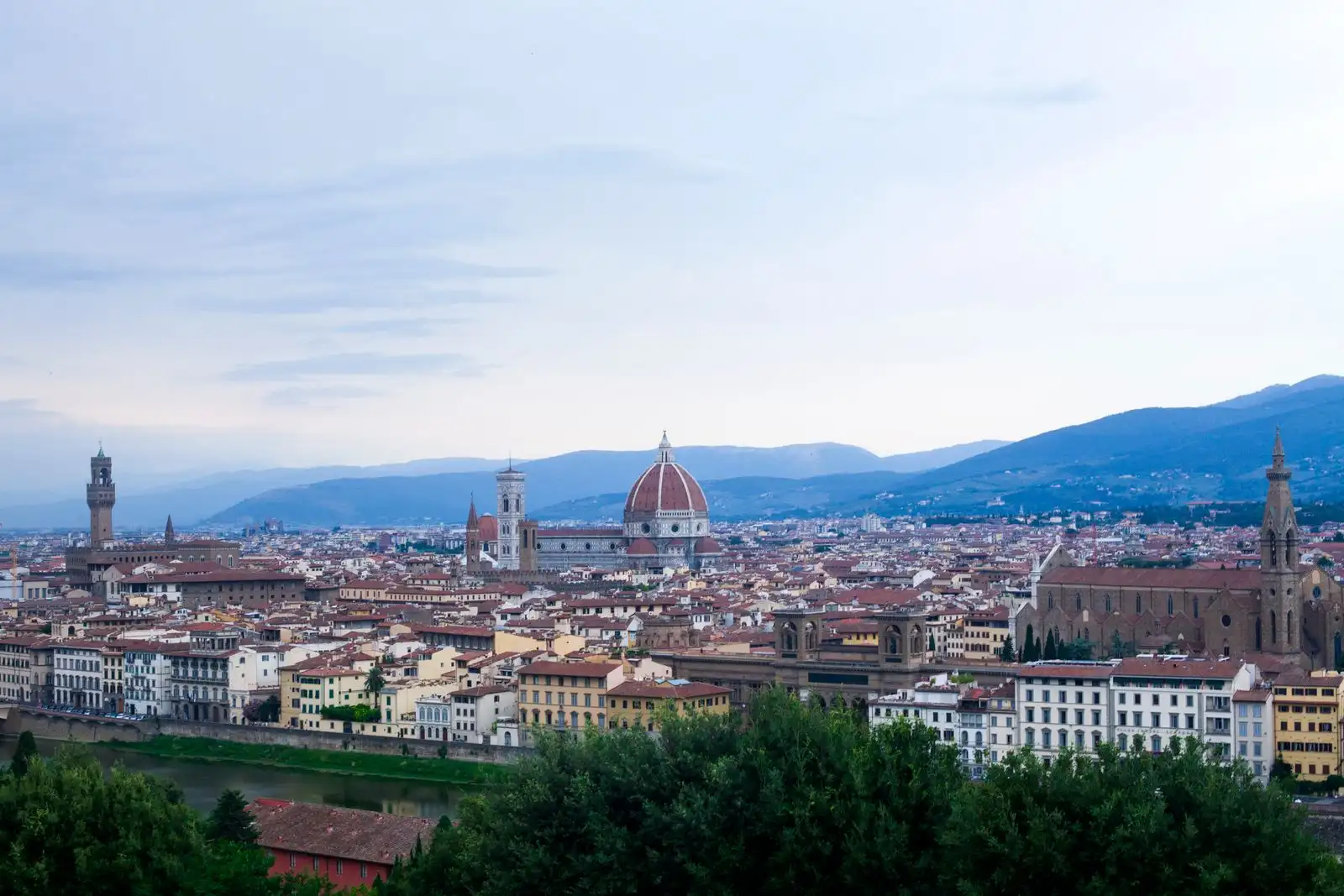 Florence Cathedral and the city's rooftops below distant hills