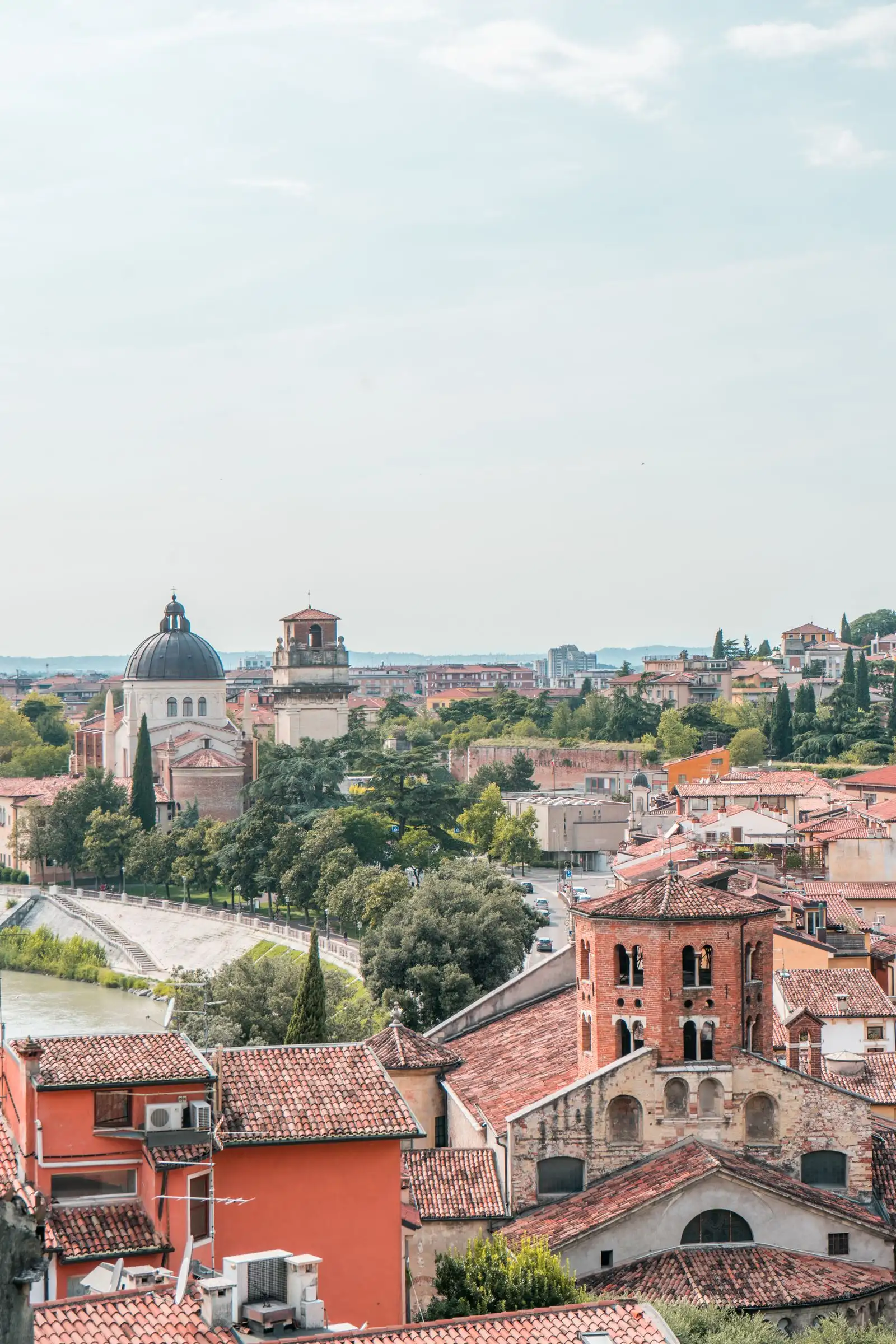 Church domes and red rooftops across Verona