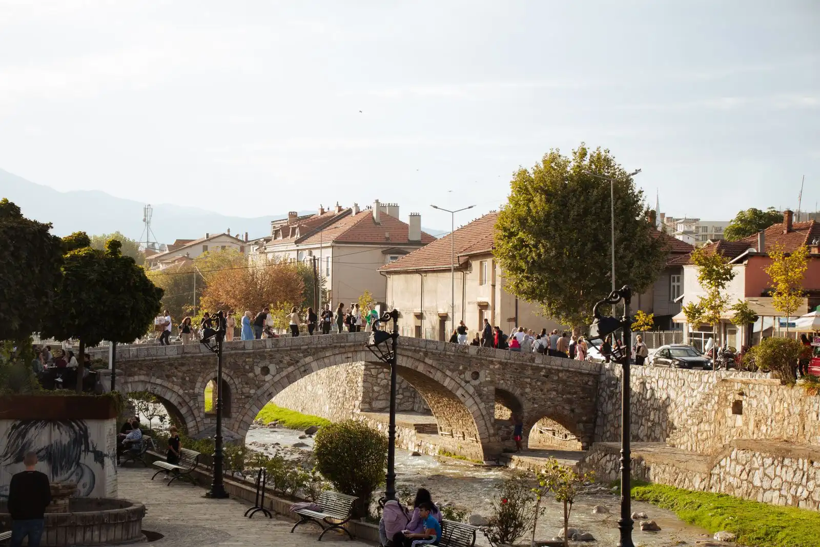 The stone bridge and riverside buildings in Prizren