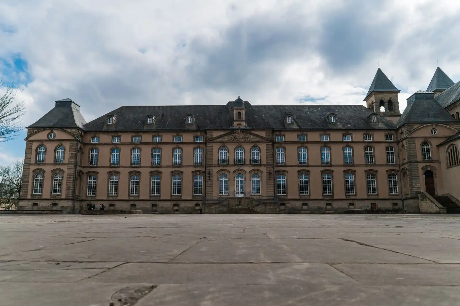 The abbey buildings around a courtyard in Echternach