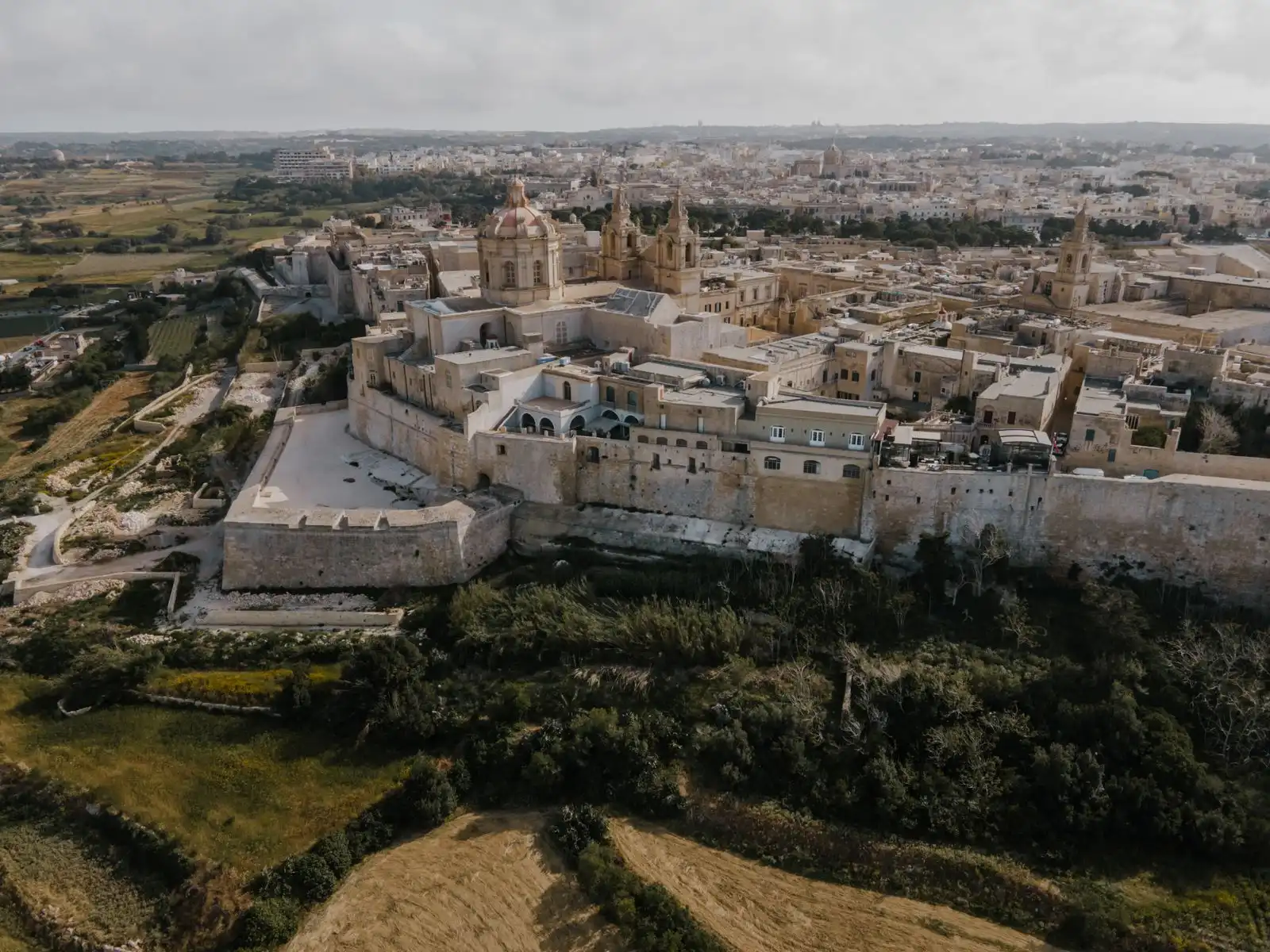 Aerial view of Mdina's walls and historic buildings