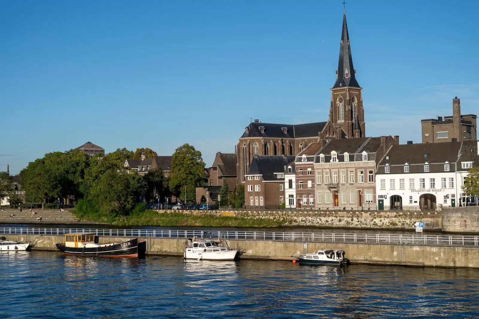 A church tower above Maastricht's rooftops