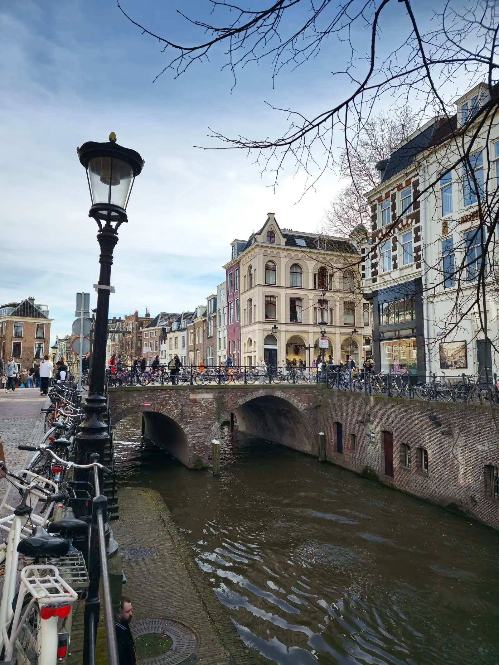 Historic houses beside a canal bridge in Utrecht