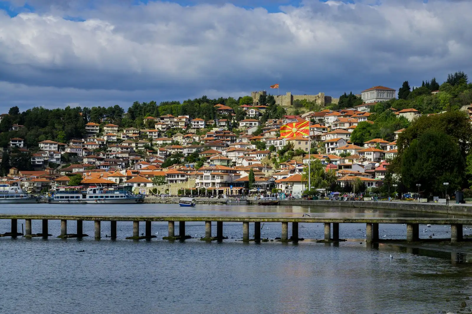 Ohrid's hillside old town and pier beside the lake