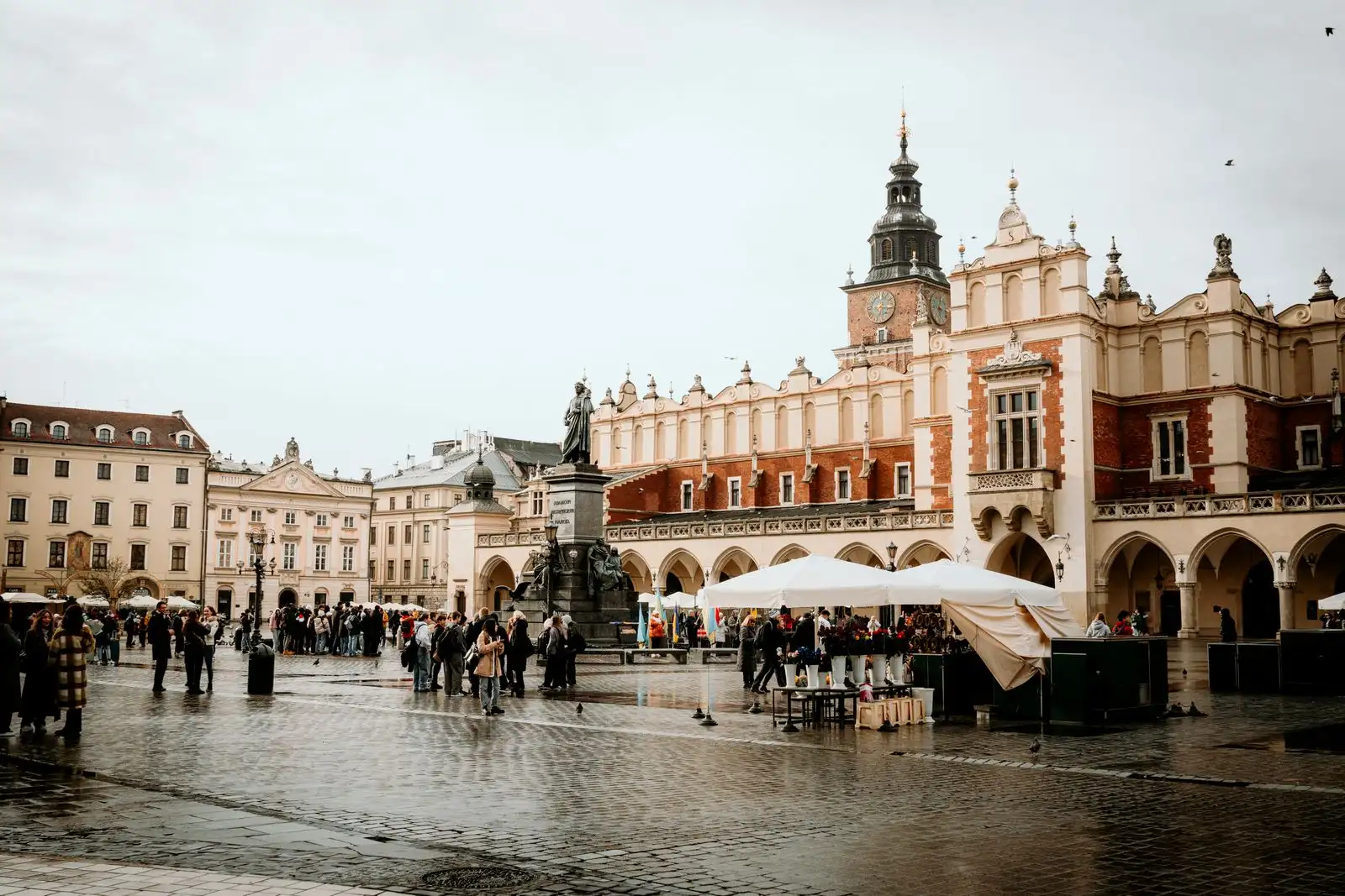 The Cloth Hall and visitors in Kraków's main square