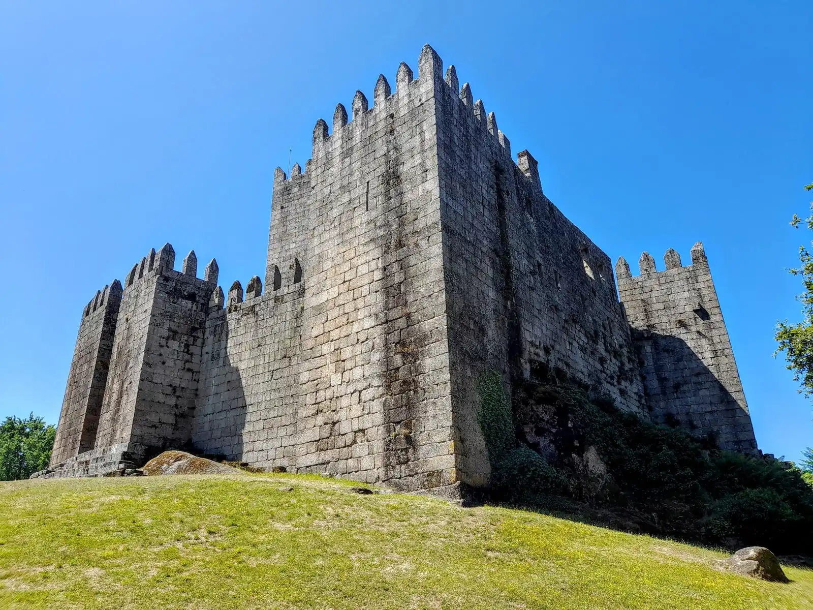 The stone towers and walls of Guimarães Castle