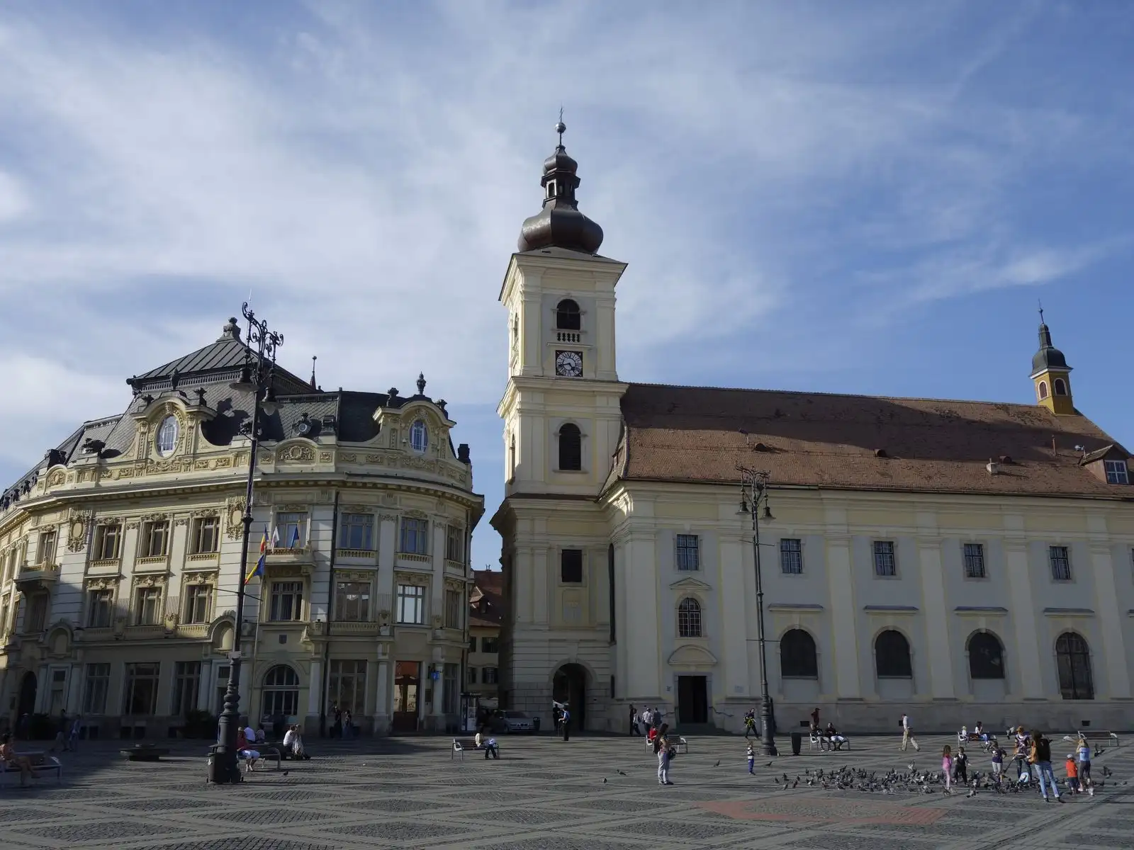 A church tower and historic buildings around Sibiu's Great Square