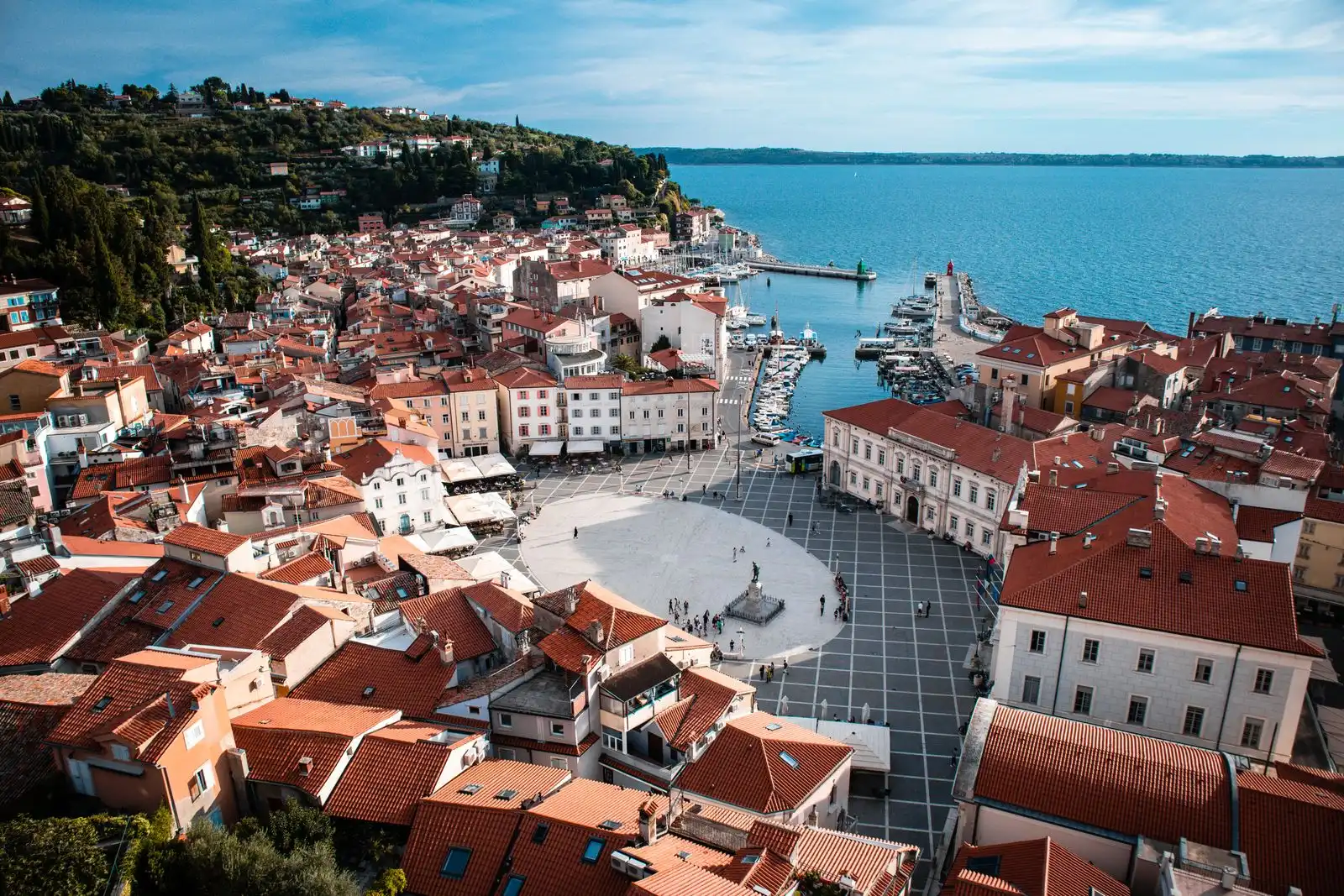 Piran's Tartini Square and red rooftops beside the harbour