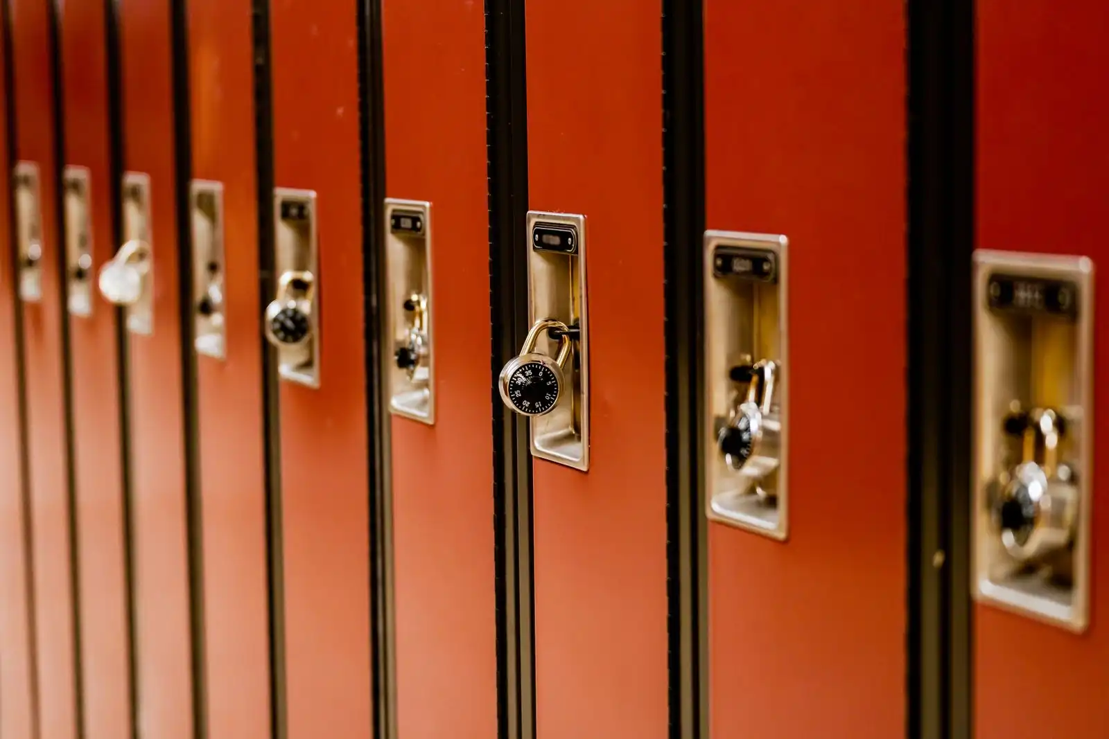 A row of storage lockers with combination locks
