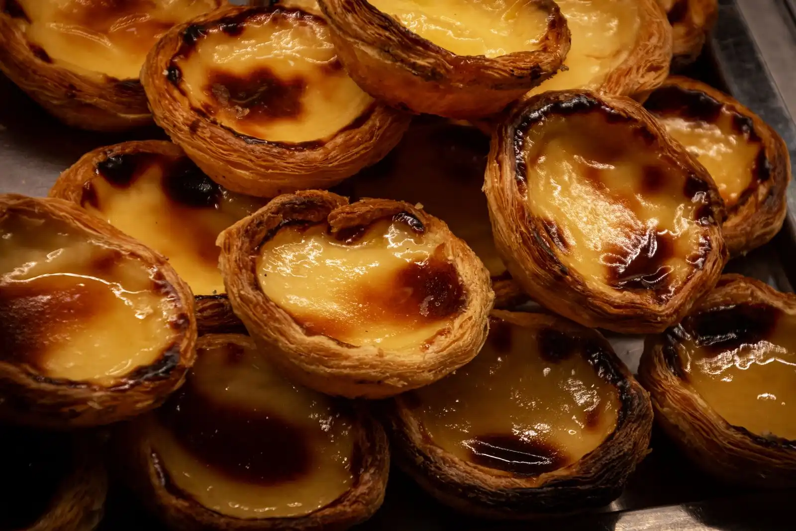 Portuguese custard tarts with caramelized tops