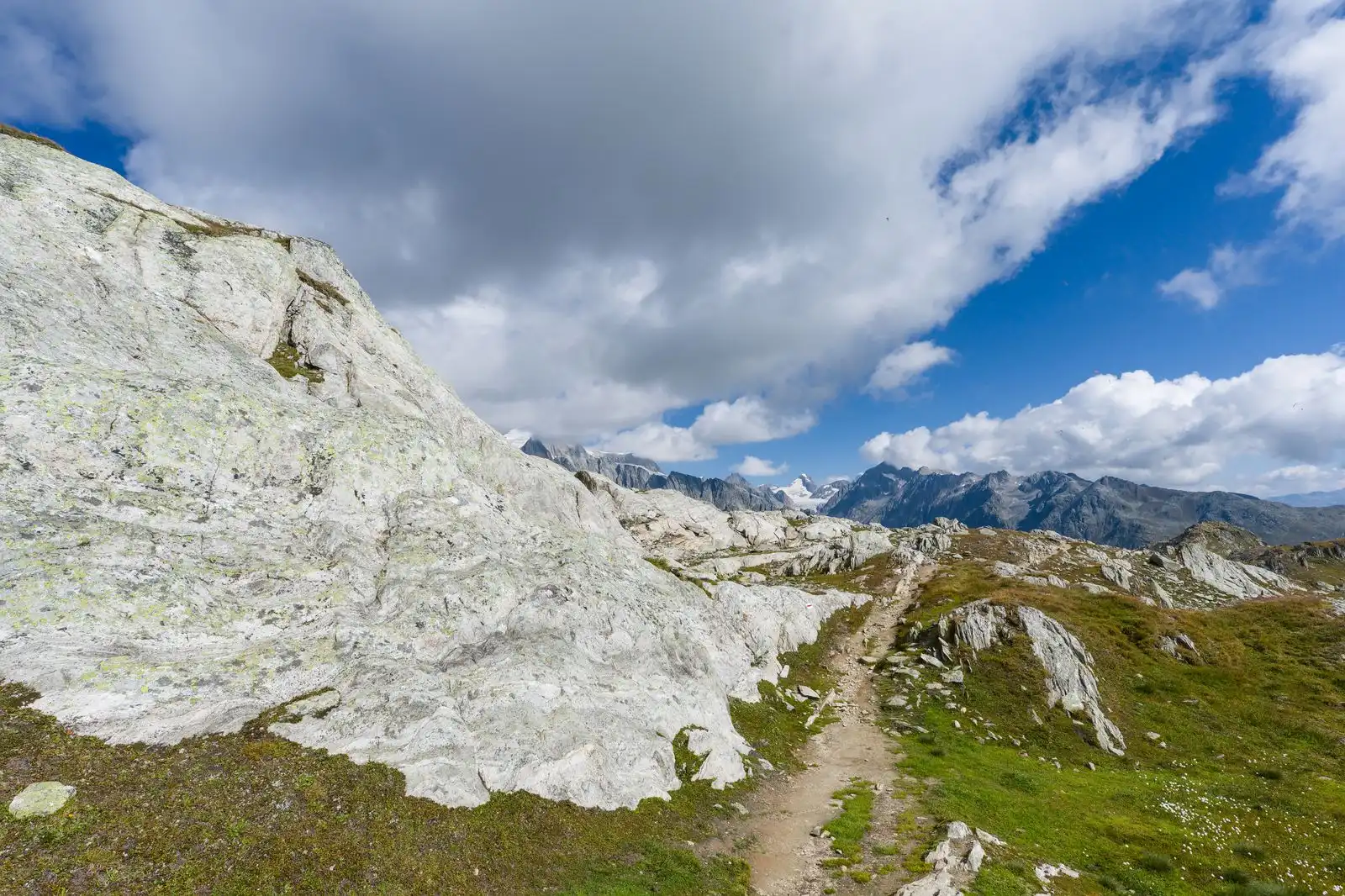Rocky ground and distant mountains in the Swiss Alps