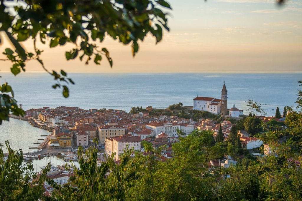 Beautiful aerial view of Piran, Slovenia, at sunset with a stunning coastal landscape.