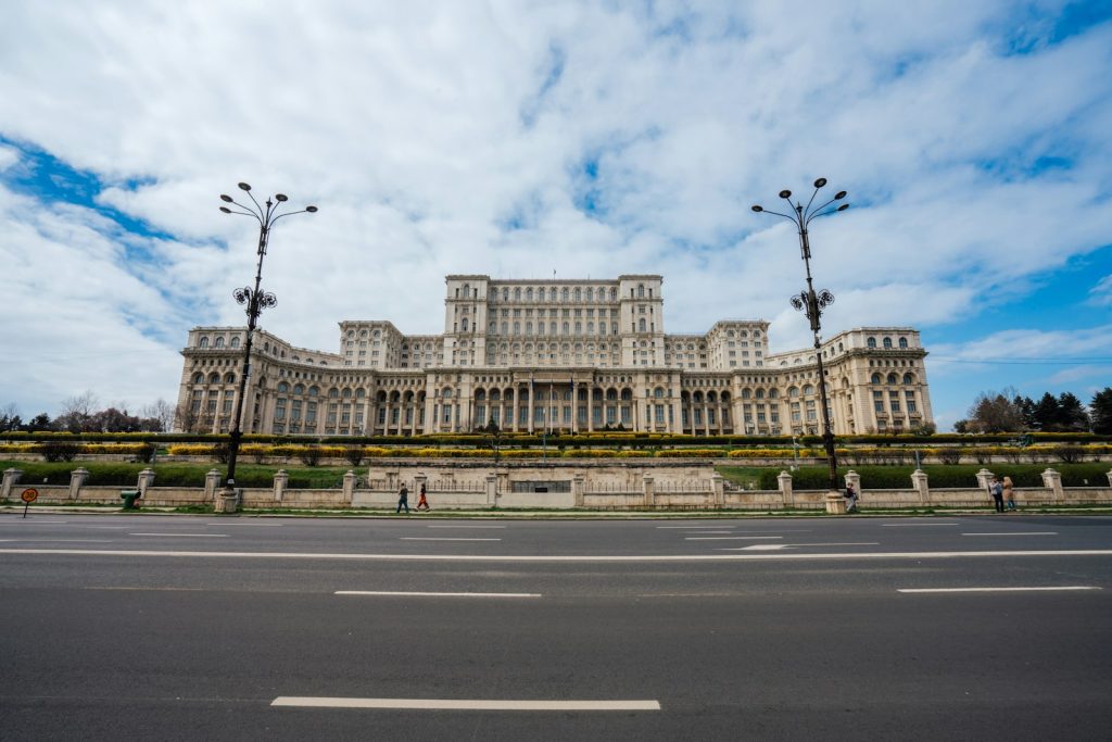 A large building sitting on the side of a road